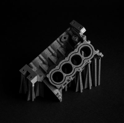 Металлическая деталь с поддержками после печати